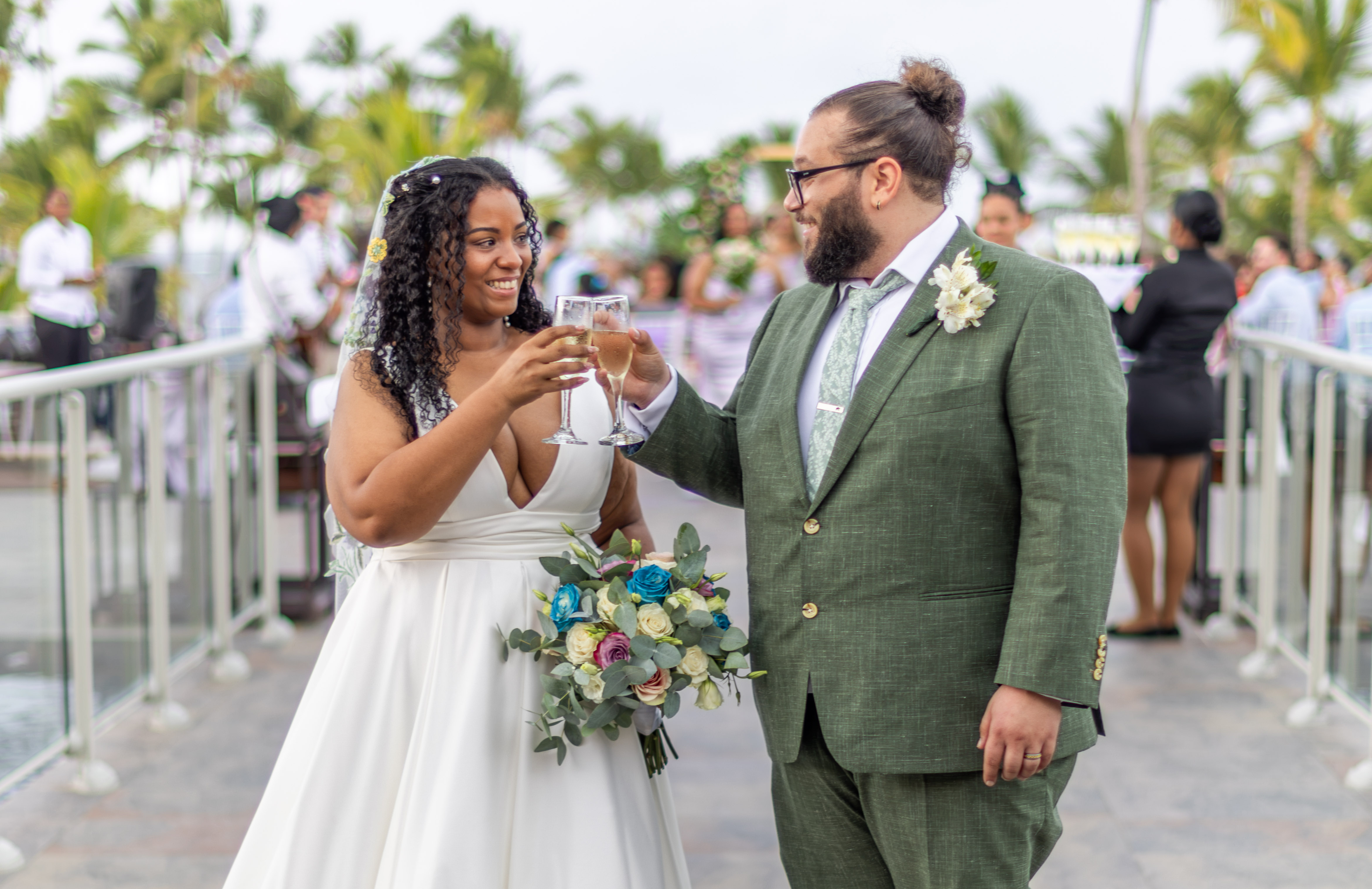 Sunset wedding toast in Punta Cana Couple toasting with champagne at tropical Punta Cana wedding, specialized wedding photographer for luxury resorts